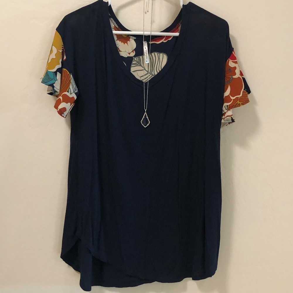 Blouse with floral sleeve detail